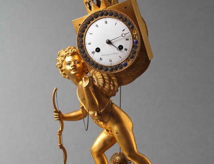Zegar kominkowy z figura Amora, początek XIX w., Zbiory Muzeum Krakowa
